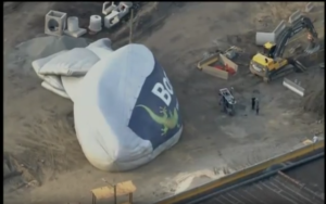 Deflated Blimp Makes Emergency Landing on Construction Site