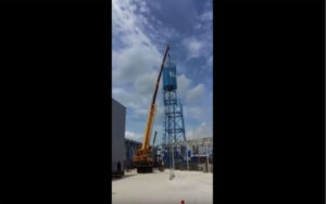 [VIDEO] Wheeled Crane Flips Trying to Remove Water Tower Tank