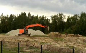 [VIDEO] Guy Tries to Fight Excavator with Rocks, Loses Obviously